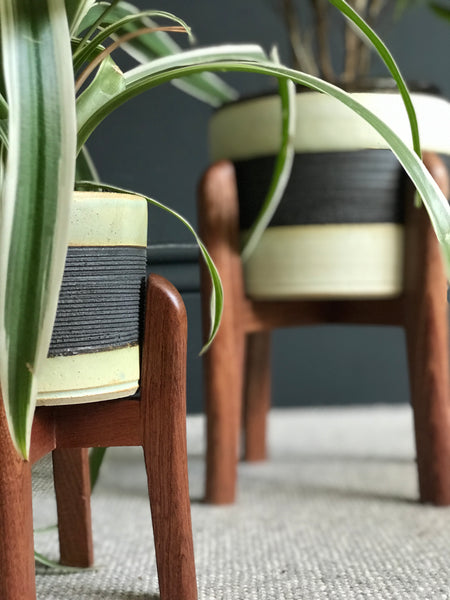 Curved mid-century plant pot stands