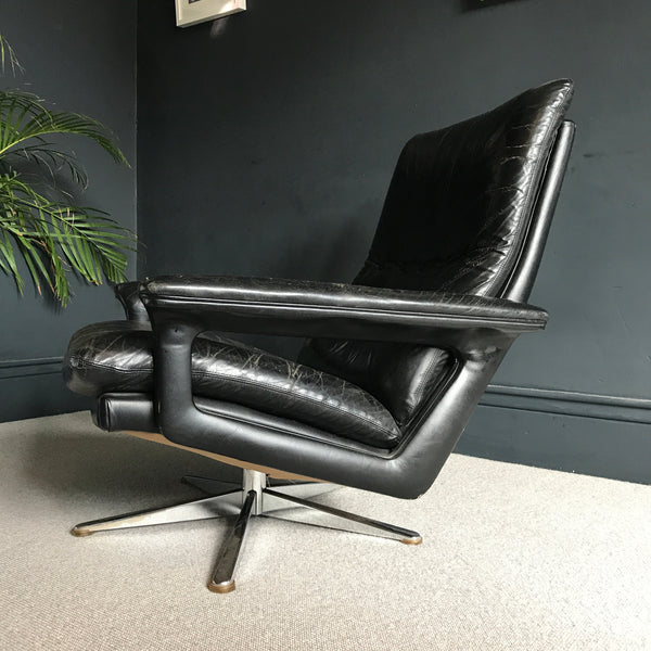 Mid-century black leather armchair