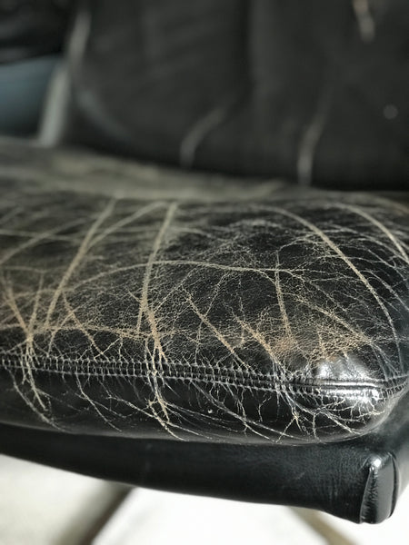 Mid-century black leather armchair