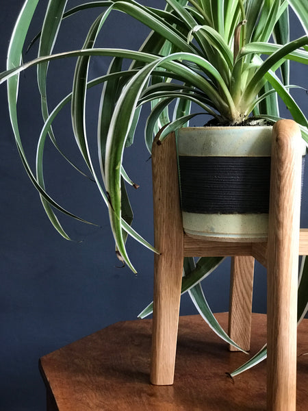 Curved mid-century plant pot stands