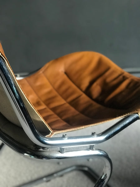 Tan leather and chrome cantilever 70s Italian chairs
