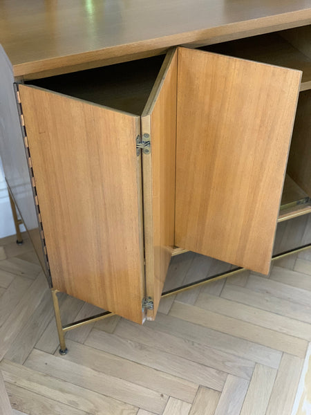 Paul McCobb for Calvin Furniture. Mahogany and brass sideboard/credenza