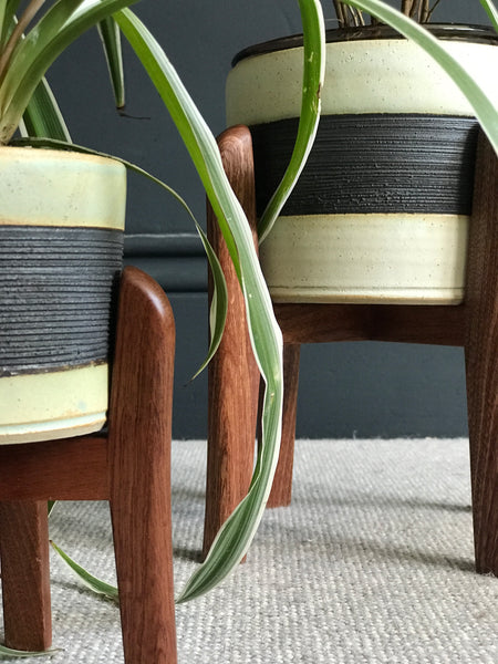 Curved mid-century plant pot stands