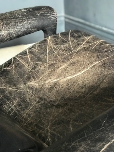 Mid-century black leather armchair