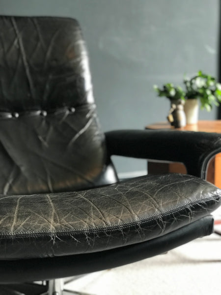 Mid-century black leather armchair