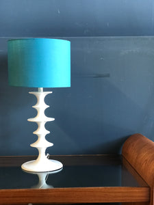White hooped metal table lamp with blue shade