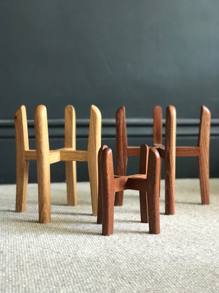 Curved mid-century plant pot stands